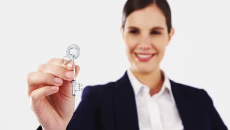 Businesswoman-holding-a-key