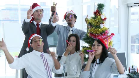 Business-team-celebrating-Christmas-in-the-office