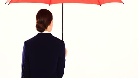 Geschäftsfrau-Steht-Und-Hält-Regenschirm