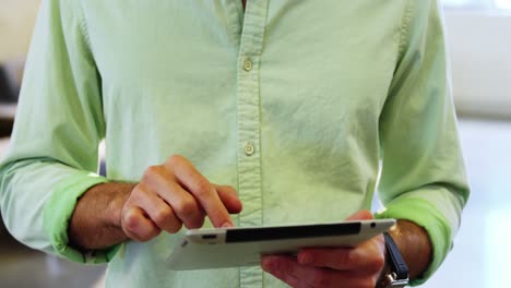 Business-executive-using-digital-tablet