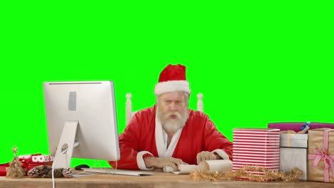Weihnachtsmann-Benutzt-Computer