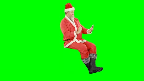 Santa-claus-using-mobile-phone