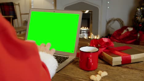 Weihnachtsmann-Mit-Laptop