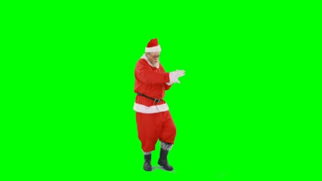 Weihnachtsmann-Tanzt-Vor-Grünem-Hintergrund