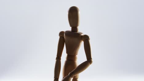 Figurine-standing-on-white-background