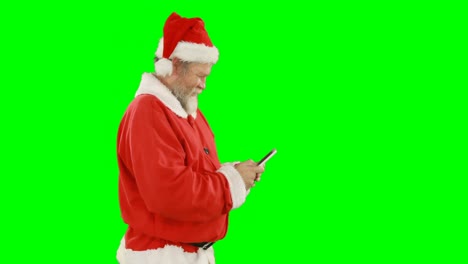 Weihnachtsmann-Benutzt-Mobiltelefon