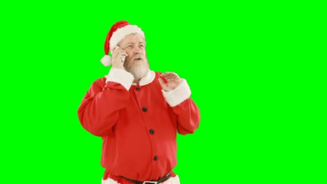 Papá-Noel-Hablando-Por-Teléfono-Móvil
