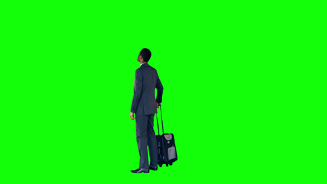 Businessman-standing-with-luggage