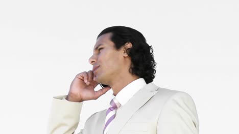 Businessman-talking-on-a-mobile-phone