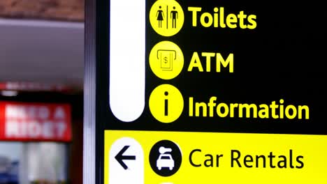 Directional-signs-at-airport-terminal