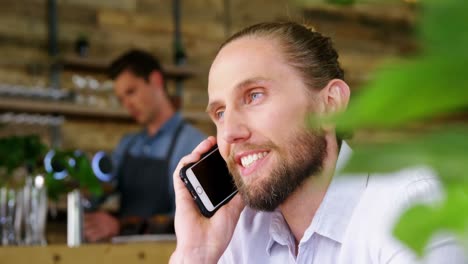 Man-talking-on-mobile-phone