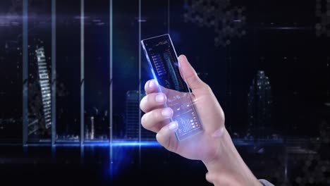 Hand-holding-futuristic-mobile-phone-against-digitally-generated-background