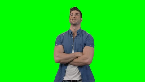 Man-standing-with-arms-crossed
