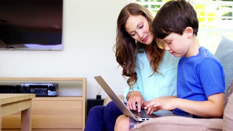 Mother-and-son-using-laptop