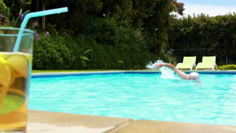 Senior-man-swimming-in-pool