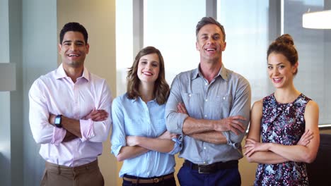 Executives-standing-with-arms-crossed