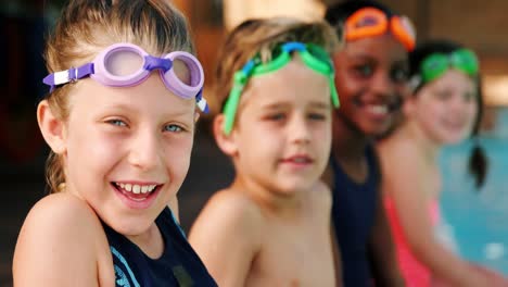 Smiling-students-wearing-swimming-goggles