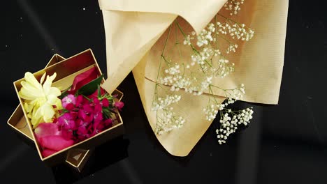 Opened-gift-box-with-a-flowers