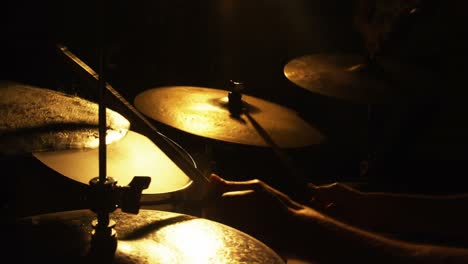 Drummer-playing-drum-in-studio