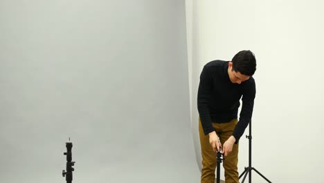 Male-photographer-working-in-the-studio