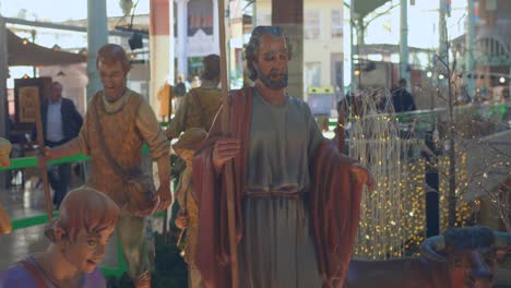 Pan-shot-of-nativity-scene-Christmas-setup-at-Market-de-Colon-in-Valencia,-Spain