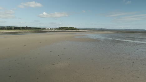 Moist-sandy-Pilmore-strand-shores-county-cork-Ireland-aerial