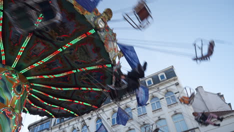 People-flying-in-a-Christmas-carousel-from-different-perspectives-at-winter-time