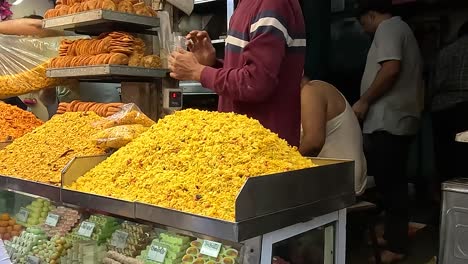 old-shop-of-Street-Market-selling-freshly-made-Indian-traditional-farsan-and-namkeen