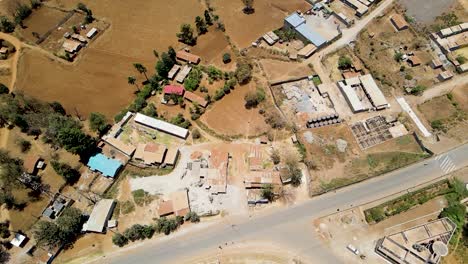 Birdseye-aerial-view-of-loitokitok-rural-village,-shanty-poor-neighborhood-of-Nairobi,-Kenya