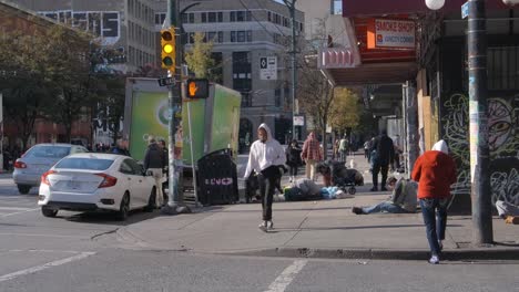 Homeless-Individuals-on-the-Streets-of-Vancouver,-Canada---Handheld-Shot