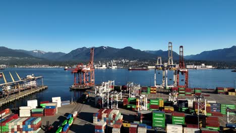 Vancouver,-British-Columbia,-Canada---A-Daylight-Perspective-of-Centerm---Centennial-Terminals-on-Burrard-Inlet---Drone-Flying-Forward