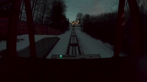 Hyperlapse-of-cable-car-going-down-from-the-hill-at-night