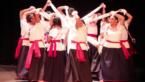 Group-of-adult-women-dancing-a-traditional-mexican-dance,-in-Mexico-is-very-common-to-see-elder-and-young-people-keep-the-traditional-dances-alive