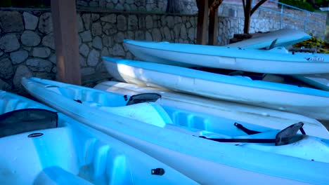 Stacked-kayaks-on-the-beach