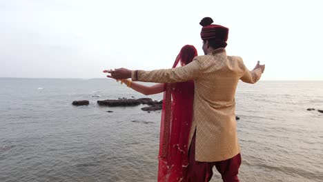 A-married-couple-posing-near-the-sea