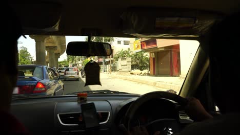 Riding-in-a-taxi-through-the-streets-of-Bangalore,-India