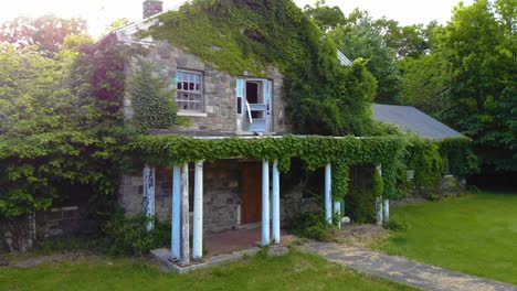 Aerial:-Abandoned-Asylum-reclaimed-by-nature-pull-away