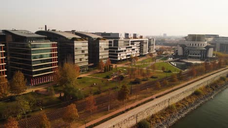 Aerial-reveal-shot-taken-of-the-National-Theatre-and-the-neighbouring-office-buildings-in-the-Millenium-district-of-Budapest,-Hungary