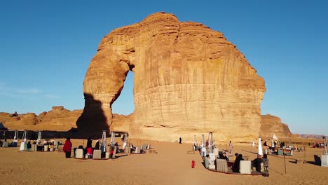 AlMu'tadil,-Saudi-Arabia-1-15-2020:-tourists-chilling-at-the-outdoor-lounge-which-surrounds-well-known-landmark-elephant-rock-in-the-desert-during-sunsets