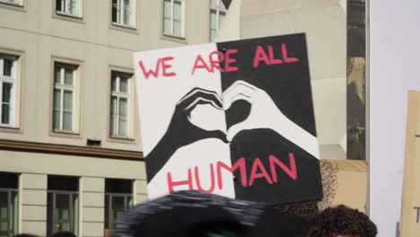 A-close-shot-of-a-protest-sign-against-racism