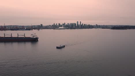 Aerial-of-Downtown-Vancouver-during-sunset-with-Seabus