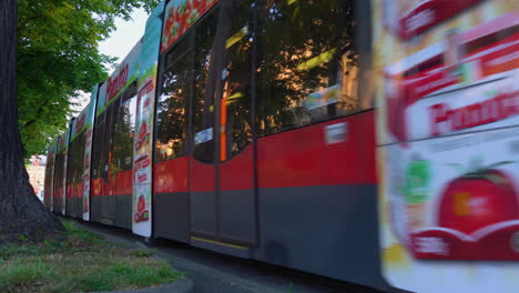 A-wide-scene-of-a-busy-morning-in-Vienna-showing-trams-and-traffic-passing-by-quickly