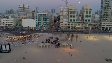 Aerial-Drone-Shot-above-Group-Of-People-training-and-Running