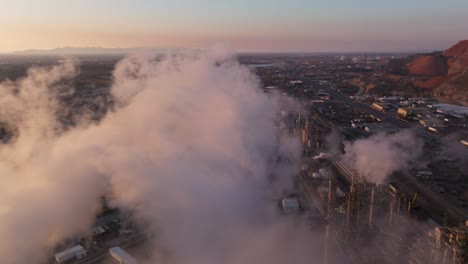 Dramatic-Aerial-Shot-close-to-Emissions-at-Refinery-in-Salt-Lake-City,-Utah