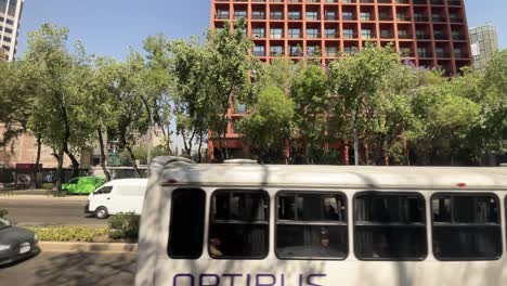 slow-motion-shot-of-paseo-de-la-reforma-avenue-and-heavy-traffic