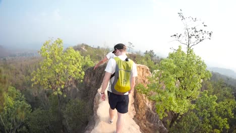 Young-youths-hiking-in-the-beautiful-mountains-on-a-holiday