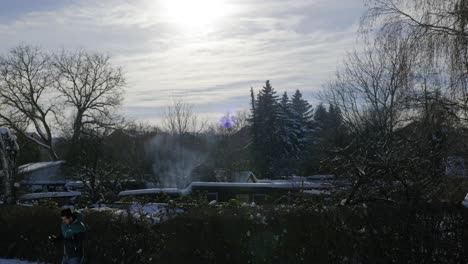 A-Guy-takes-some-Photos-with-a-Smartphone-on-a-snowy-Day