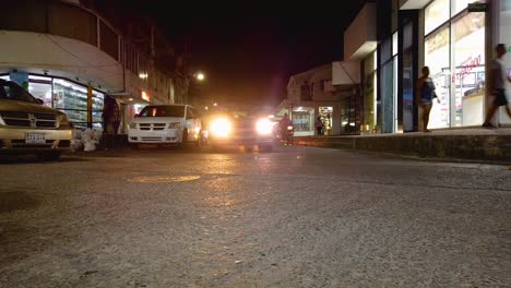 Panorama-Of-Bustling-Street-And-Open-Business-Stalls-At-Night-In-San-Andres,-Colombia