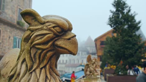 Panning-shot-revealing-eagle-structure-at-Bà-Nà-Hills-resort,-near-Da-Nang,-Vietnam-during-day-light-at-4k-UHD-60-fps-in-slow-motion