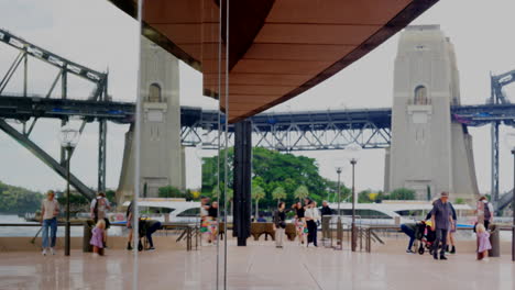 Tourists-hanging-around-next-to-the-opera-house-in-Sydney-Australia